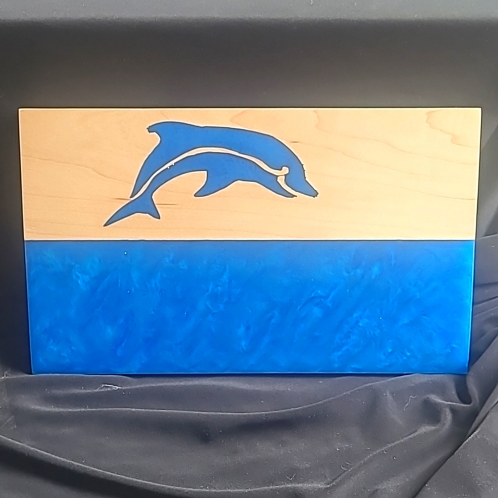 Dolphin engraved serving board